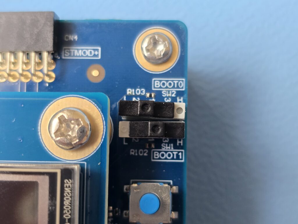 Image demonstrating the position for the STM32N6570-DK boot switches for developer mode.